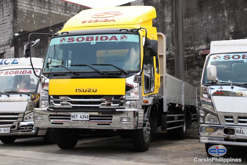 Pictures of Isuzu F-Series FRR Cargo Truck Dropside 4x2 6wheel Manual 2019