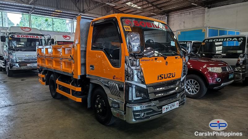 Pictures of Isuzu Elf Surplus Remanufactured NKR Dropside Dump Truck N-series Canter Manual 2023