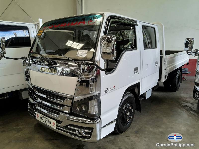 Pictures of Isuzu N-Series Double Cab Dropside 4x2 Manual 2019