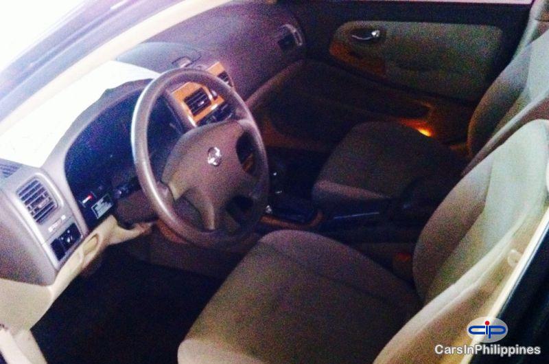 Nissan cefiro салон