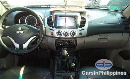 Mitsubishi Strada 2010 - image 2