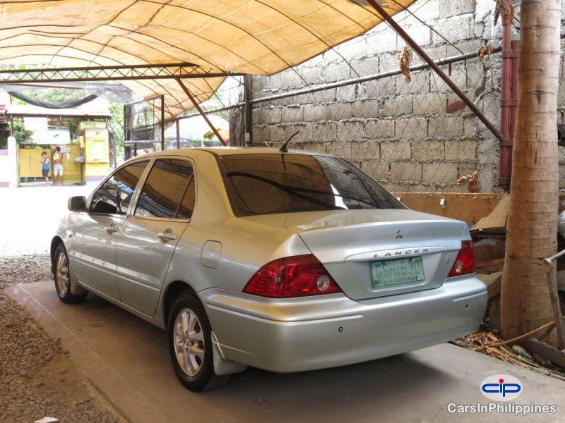 Mitsubishi Lancer Manual 2003 - image 2